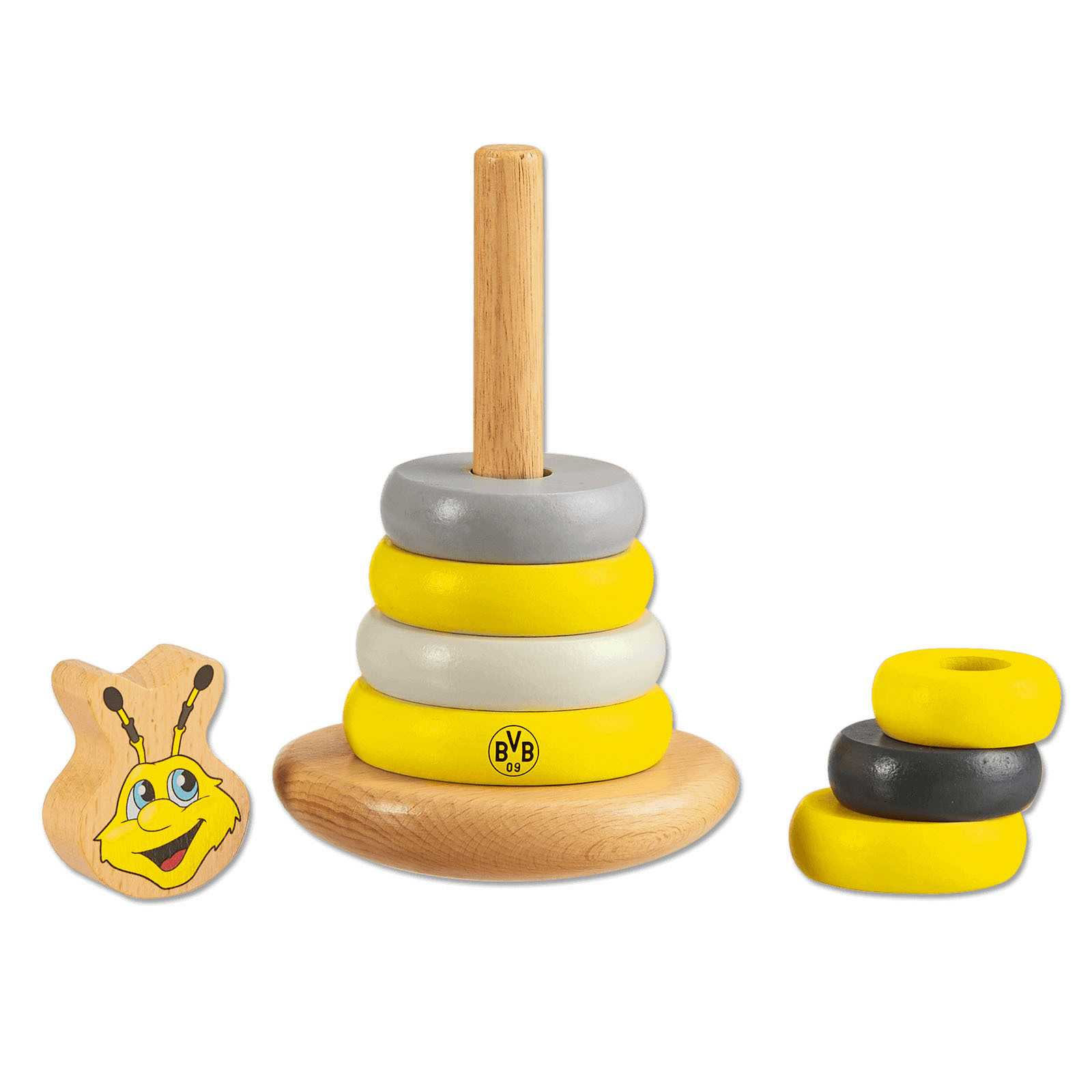 Vorderansicht des BVB-Stapelturms aus Holz mit gelben, schwarzen und grauen Ringen, BVB-Emblem auf der unteren Scheibe und EMMA-Figur daneben.