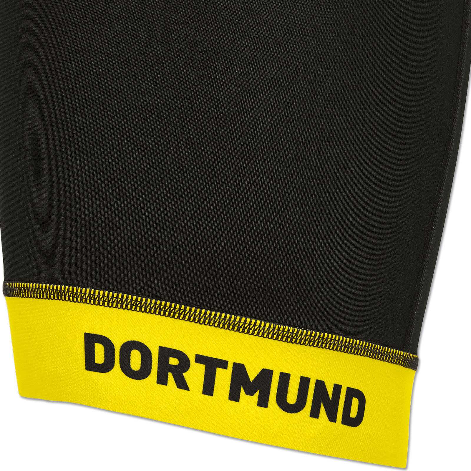 Detailansicht der schwarzgelben BVB-Radhose mit gelbem Beinabschluss und dem schwarzen Schriftzug "DORTMUND" auf dem Saum.