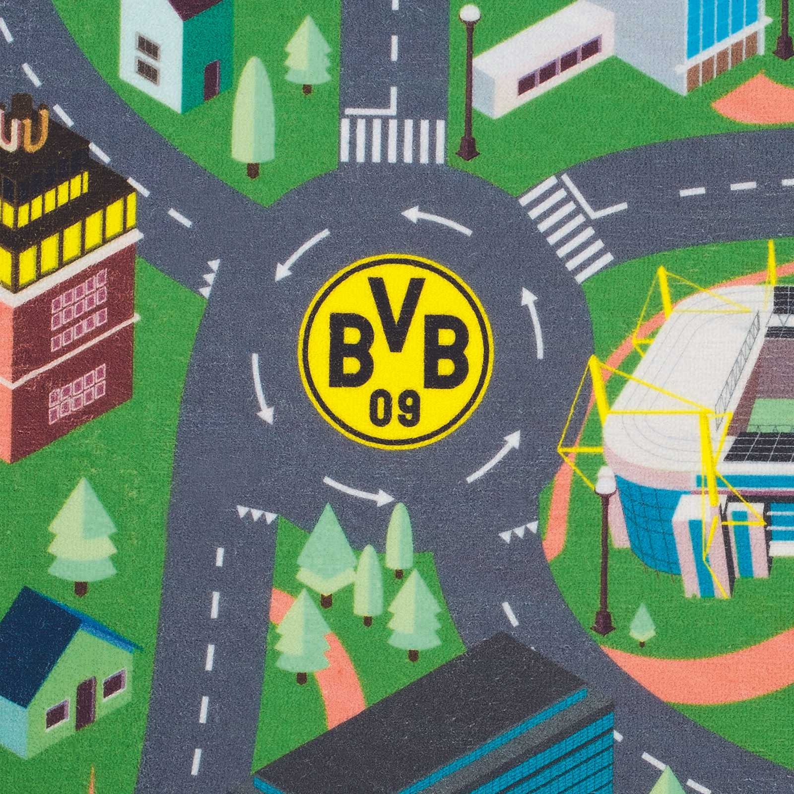 Detailansicht des BVB Spielteppichs mit einer Straßenkreuzung, dem schwarzgelben BVB-Emblem in der Mitte und dem SIGNAL IDUNA PARK.