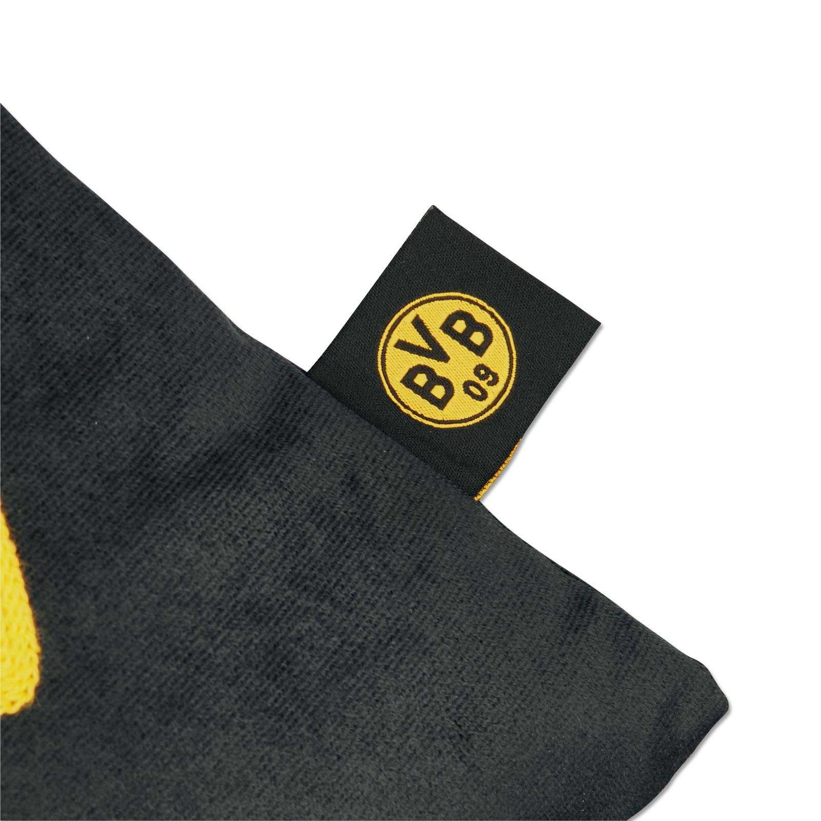 Detailansicht des BVB Kordelkissens Borussia Dortmund in schwarzgelb mit eingenähtem Label, das das BVB-Emblem zeigt.