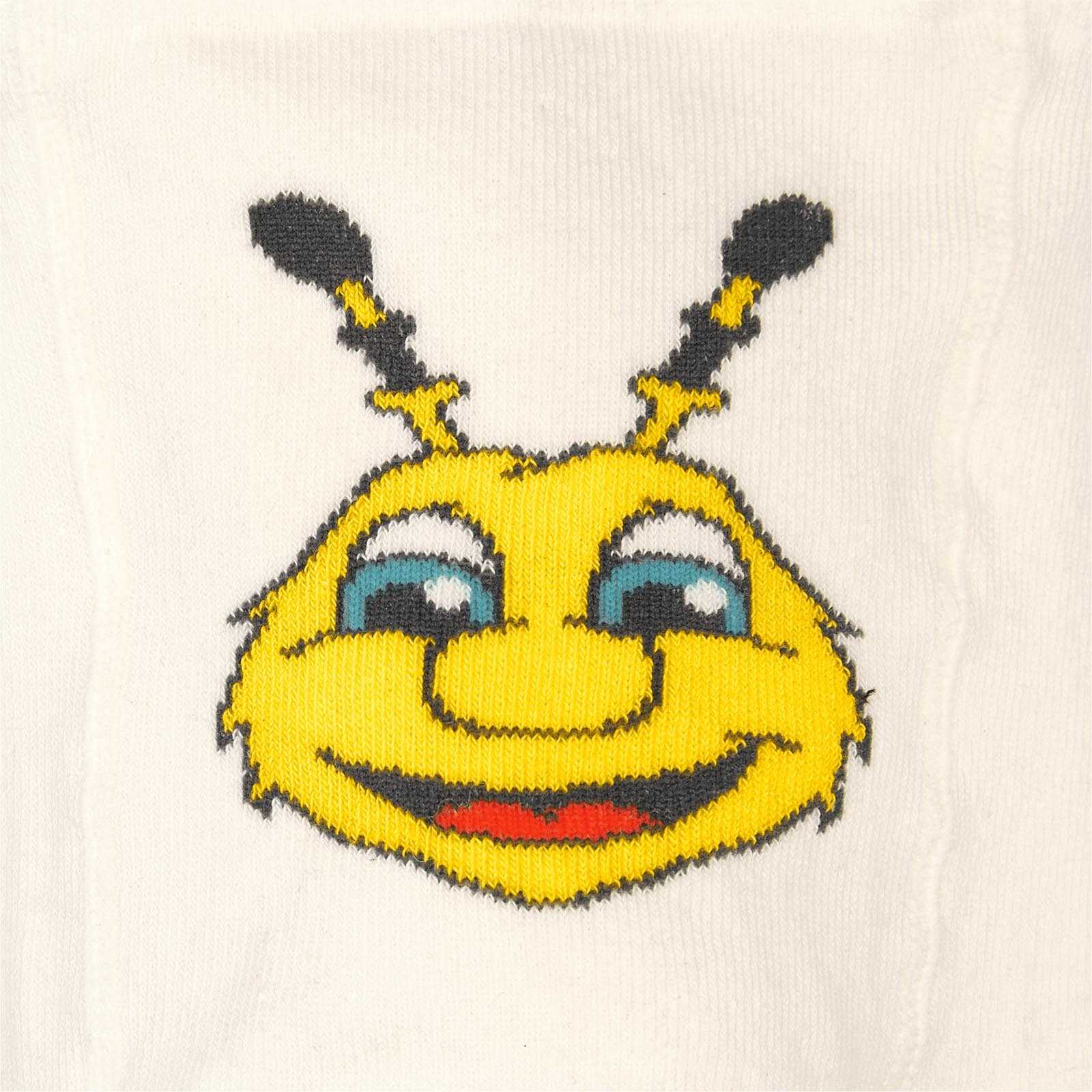 Detailansicht der BVB Baby Strumpfhose (2er Pack) mit großem EMMA-Motiv in gelb auf weißem Stoff.