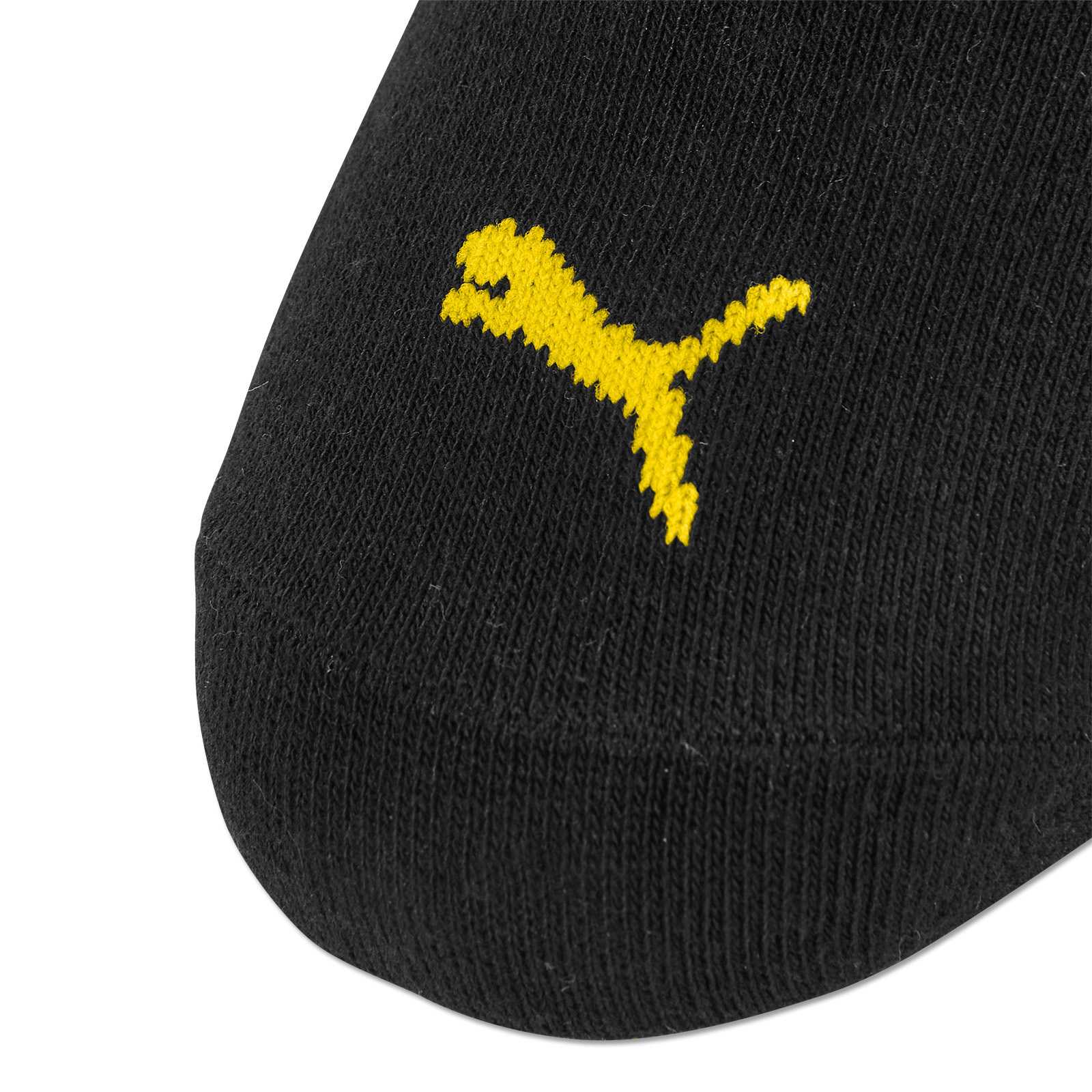 Detailansicht der schwarzgelben BVB-Sneaker Socken (Puma) im 3er Pack, mit gelbem Puma-Logo auf schwarzem Stoff.