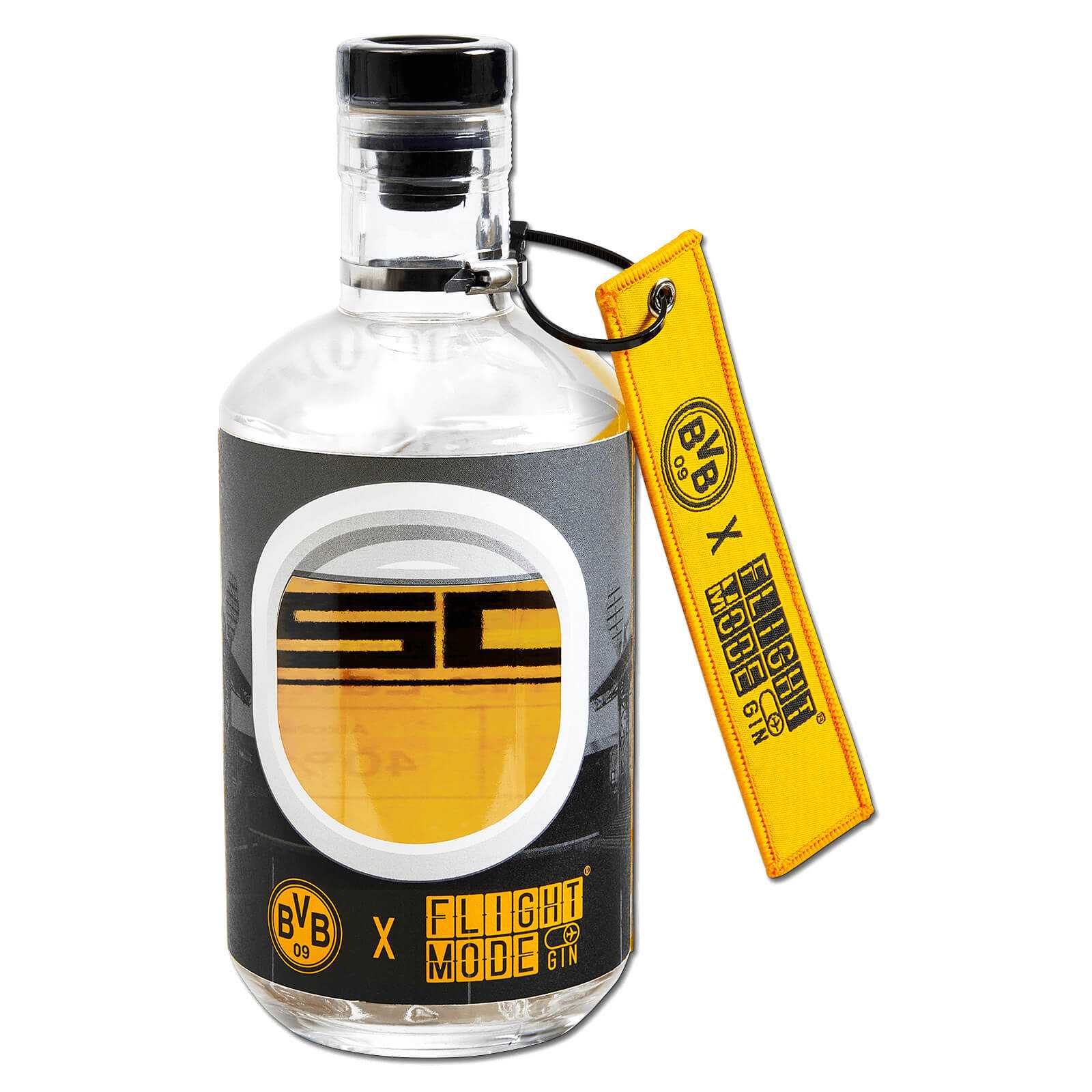 Frontansicht der BVB Gin "Flight Mode" Flasche zum Stadionjubiläum mit schwarzgelbem Label, BVB-Emblem und Flight Mode Gin Logo. Gelber Anhänger sichtbar.