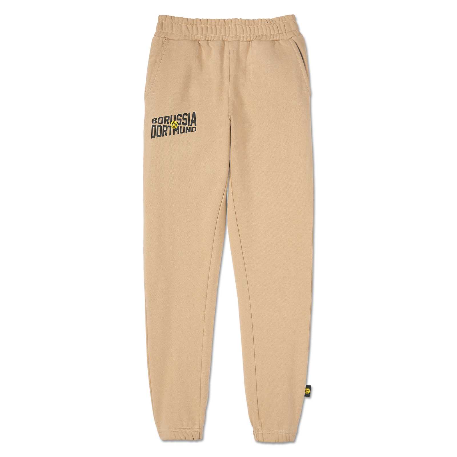 Vorderansicht der BVB Sweatpants beige Kinder mit elastischem Bund und seitlichen Taschen, schwarzem Borussia Dortmund-Schriftzug in schwarzgelb.