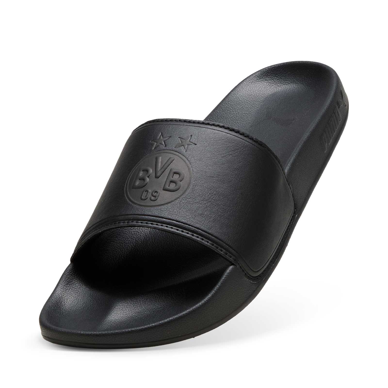 Seitenansicht der schwarzen Leadcat 2.0 BVB Monochrome Pantolette mit geprägtem BVB-Emblem auf dem Riemen und Puma-Schriftzug an der Sohle.