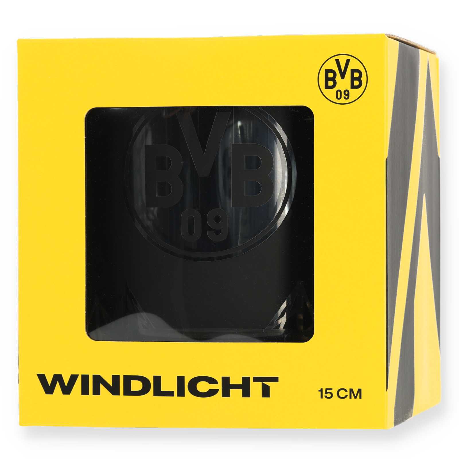 Das Windlicht in der gelben Verpackung mit schwarzer Windlicht-Aufschrift.