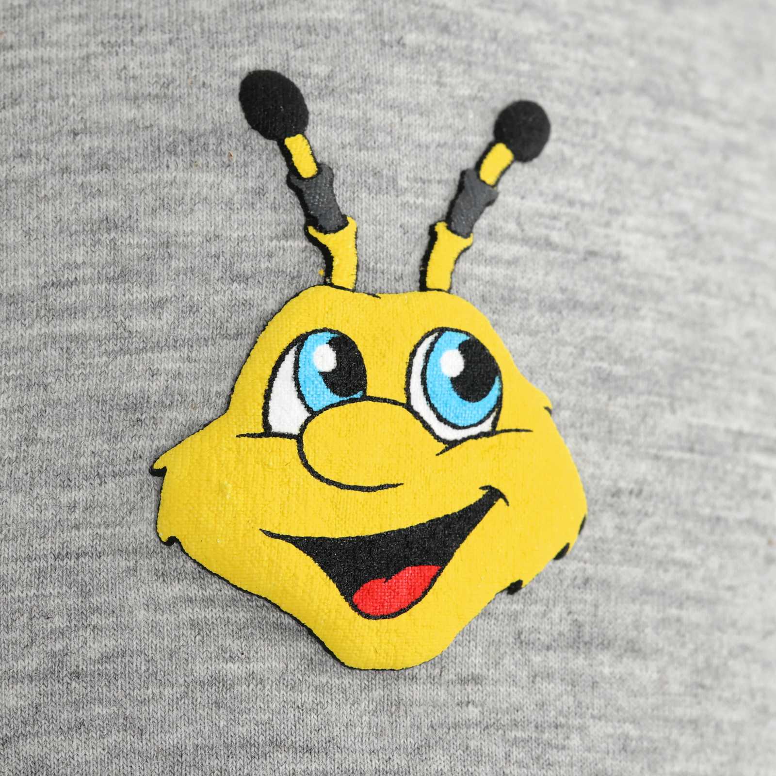Detailansicht vom Gesicht des Maskottchens EMMA.